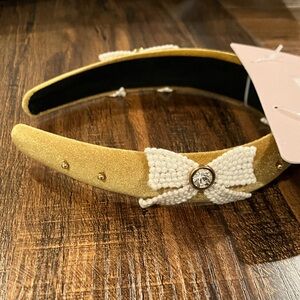 Chic Gold Headband with White Bow Accent